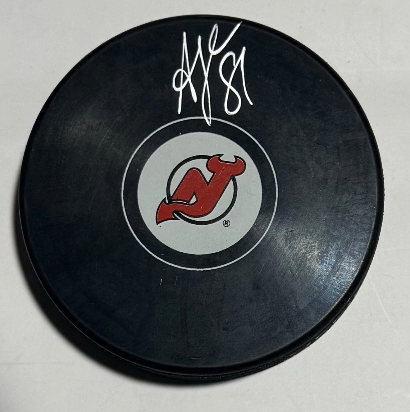 Arseniy Gritsyuk Signed Devils Logo Puck JSA Witness Auth